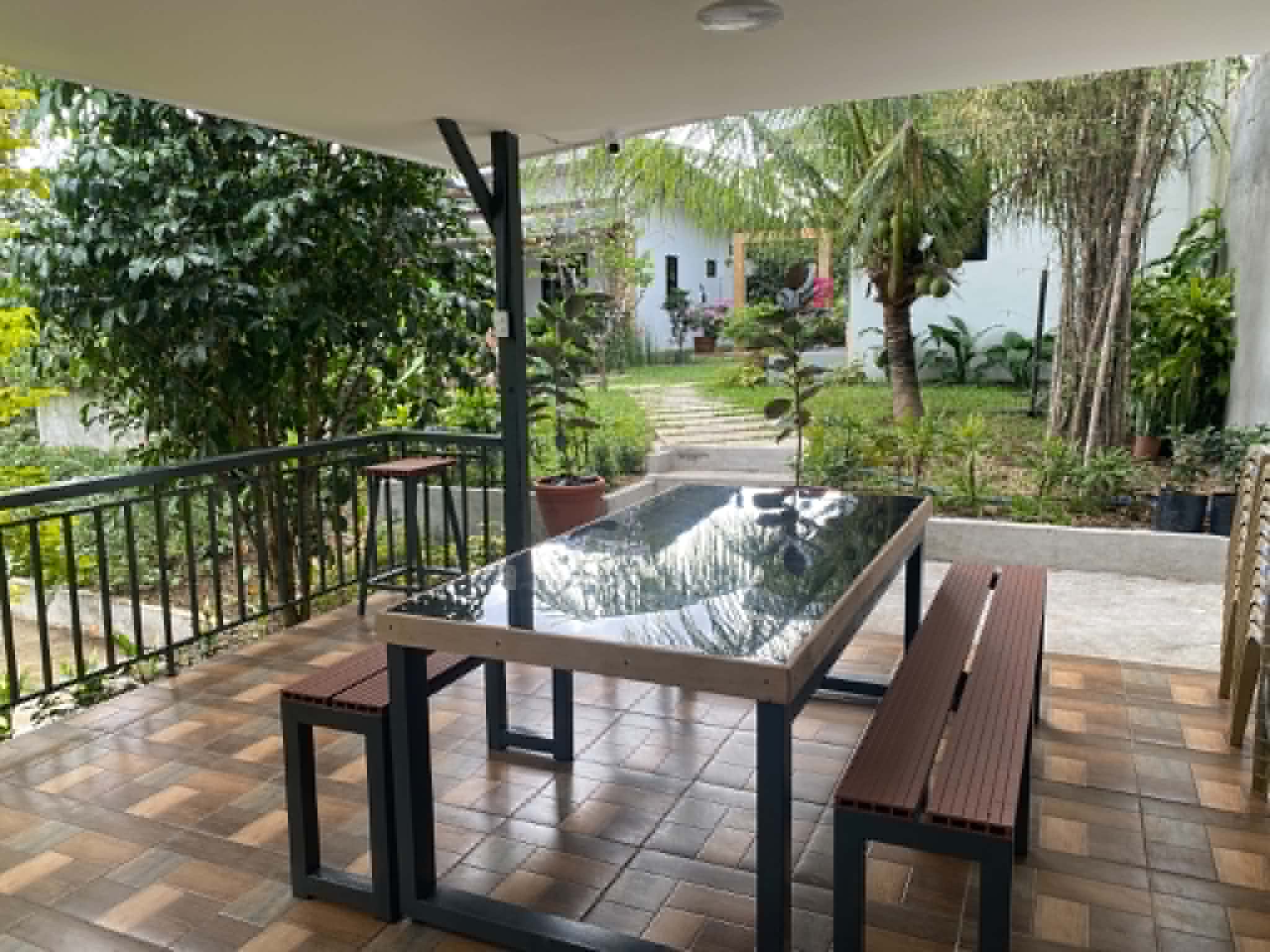 Villa 1 garden bench and outdoor walkway