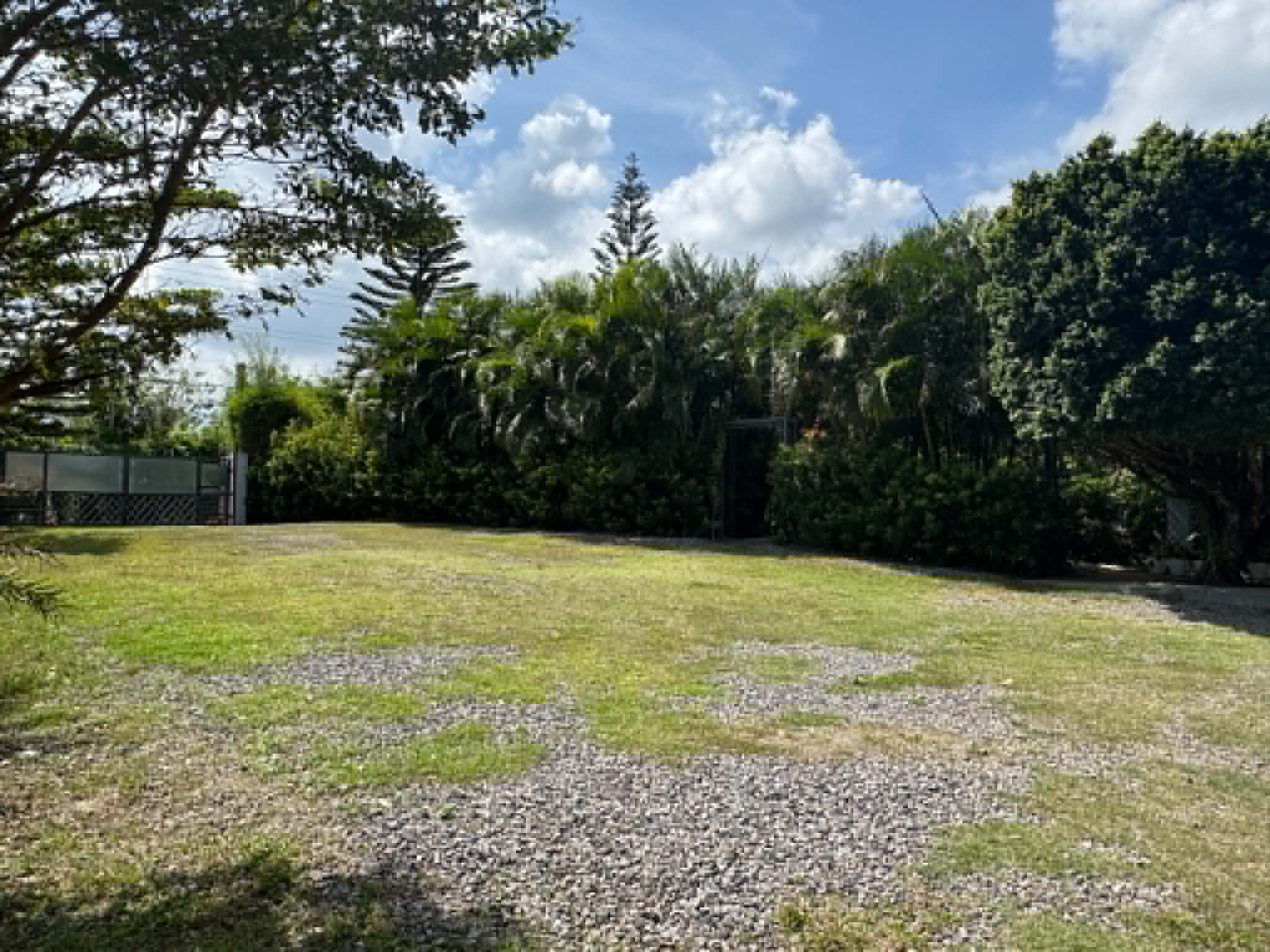 Open lawn area near Villa 1