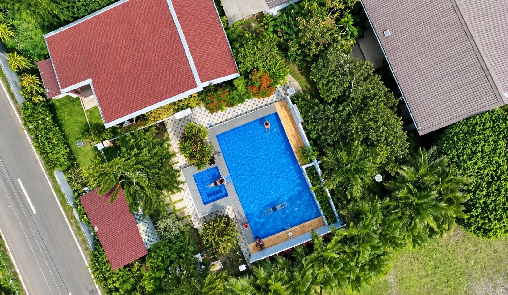Aerial view of the Villa 1 swimming pool and surrounding gardens