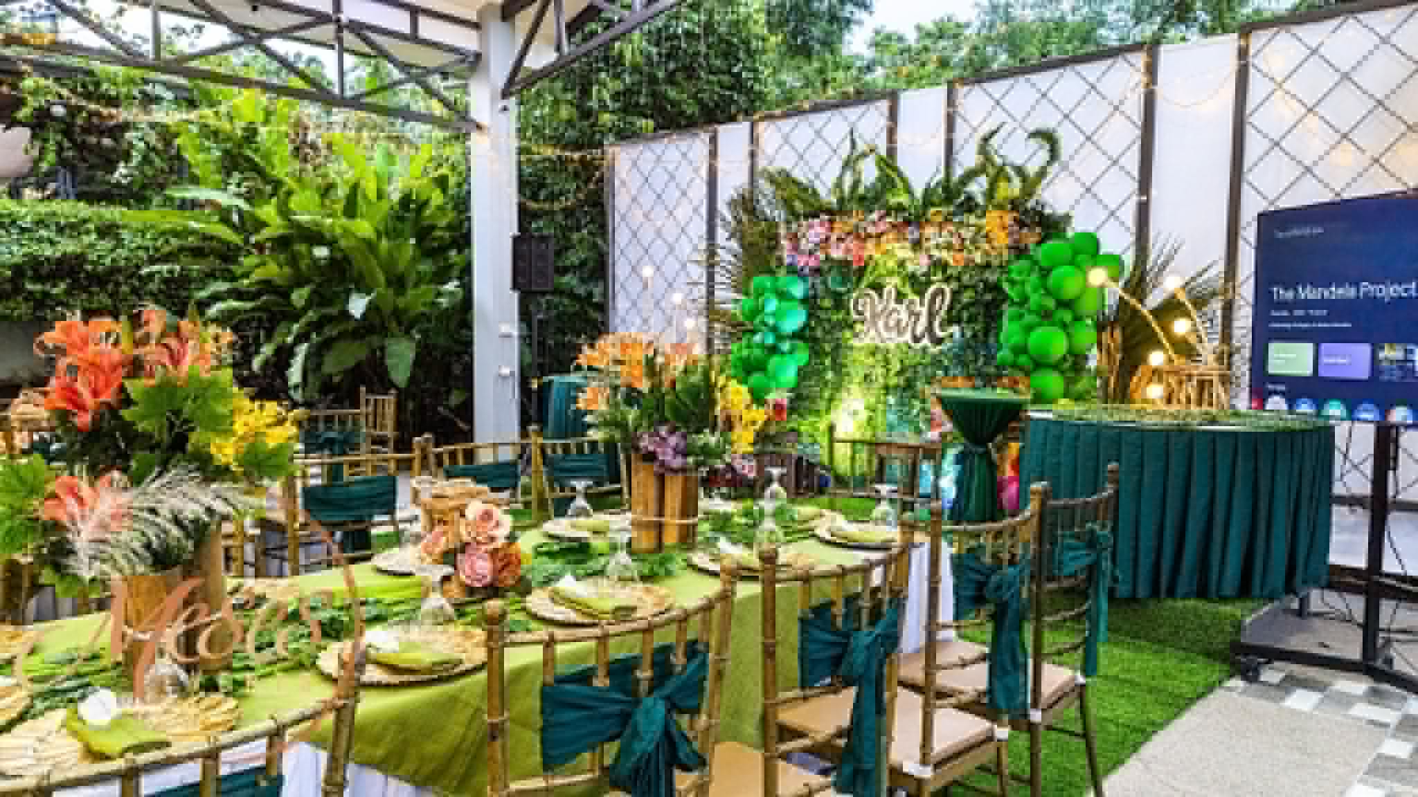 Villa 1 tropical dessert and backdrop area with guest tables
