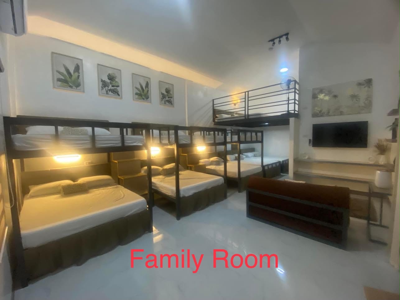 Villa 1 family room with loft beds