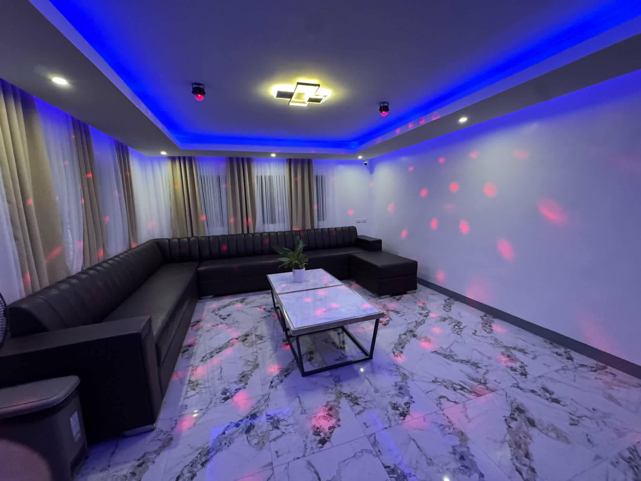 Villa 2 karaoke lounge with blue lights