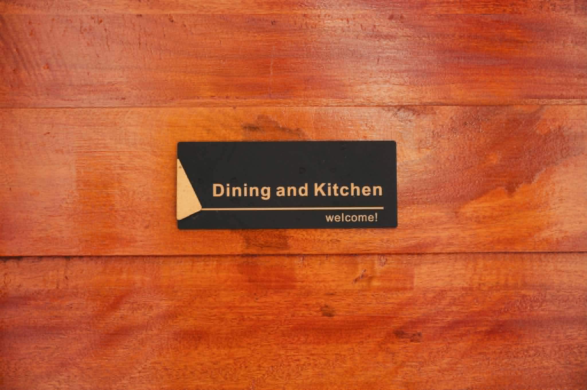 Villa 2 dining and kitchen sign