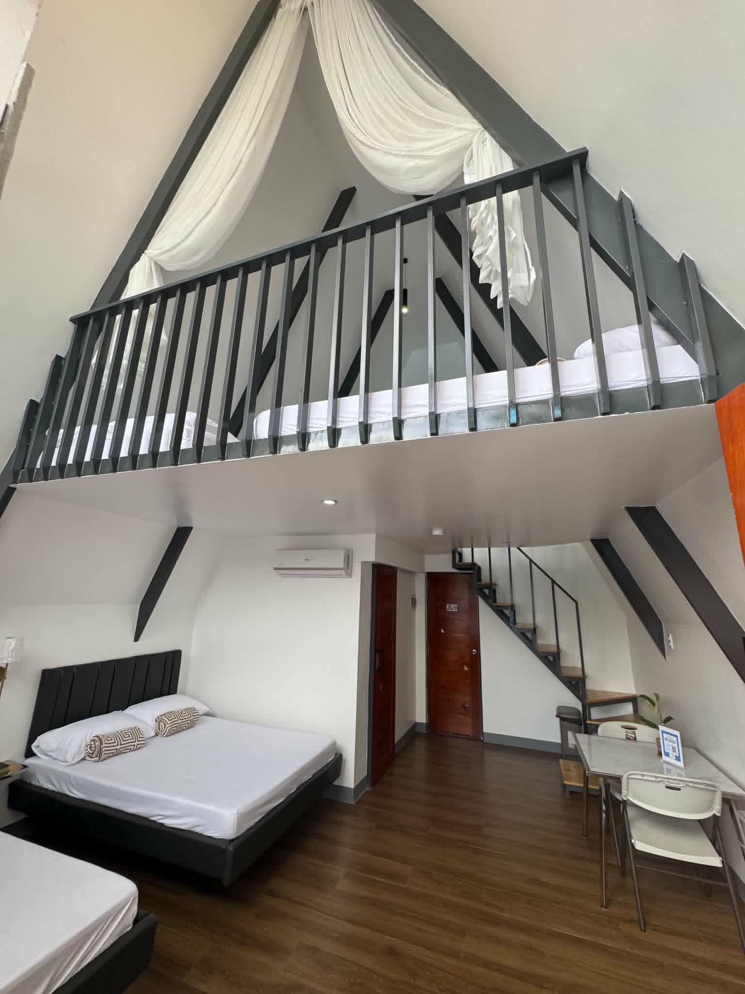 Villa 2 A-frame room with loft and bed
