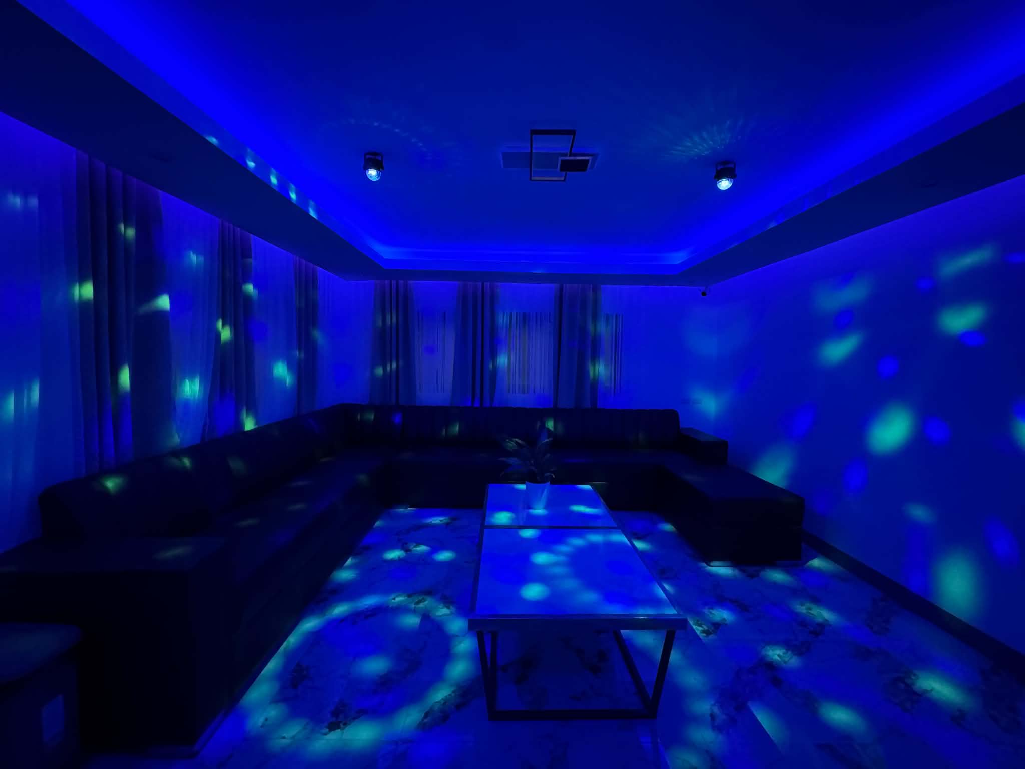 Villa 2 entertainment room with party lights