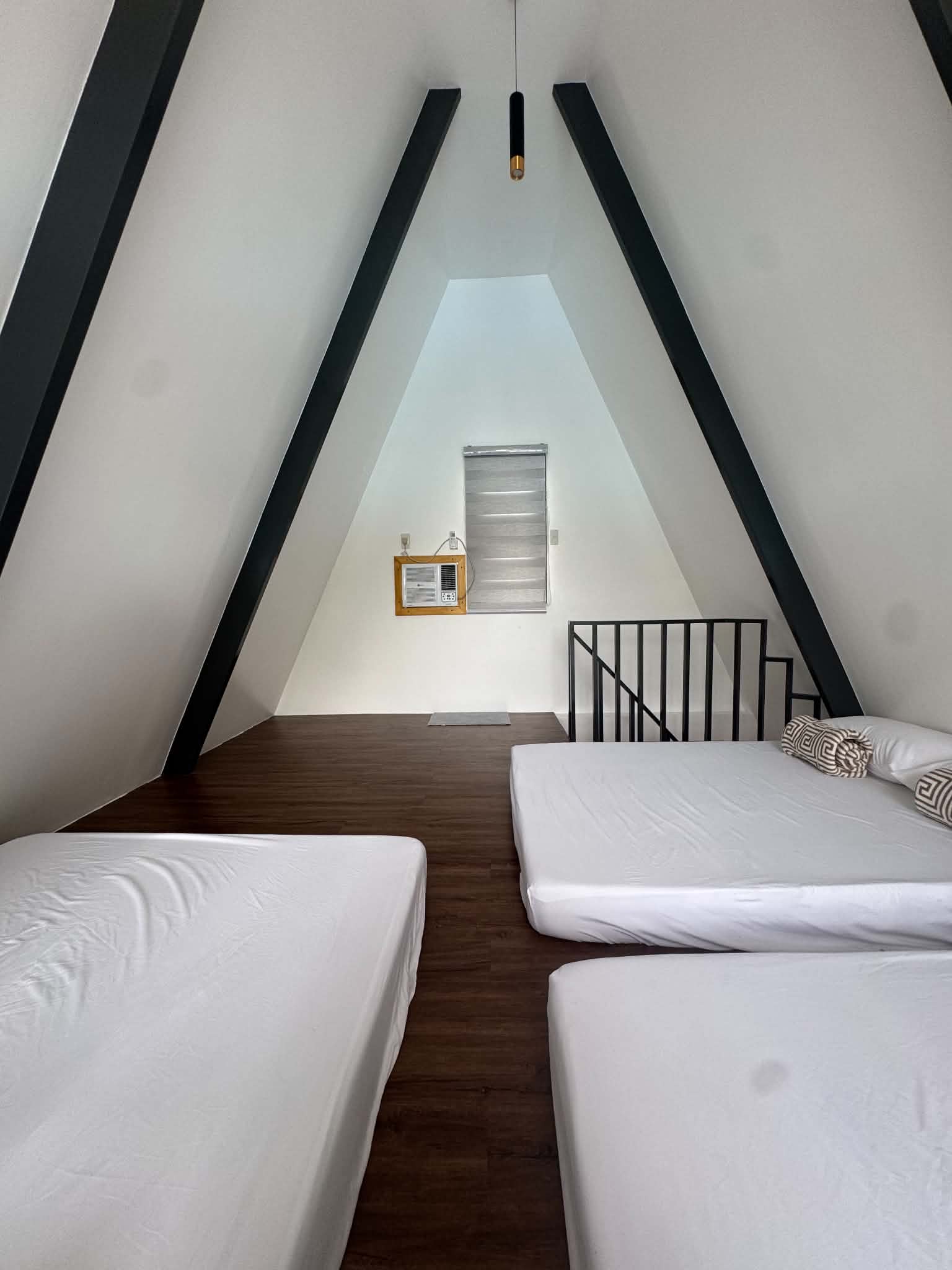 Villa 2 A-frame bedroom with twin beds