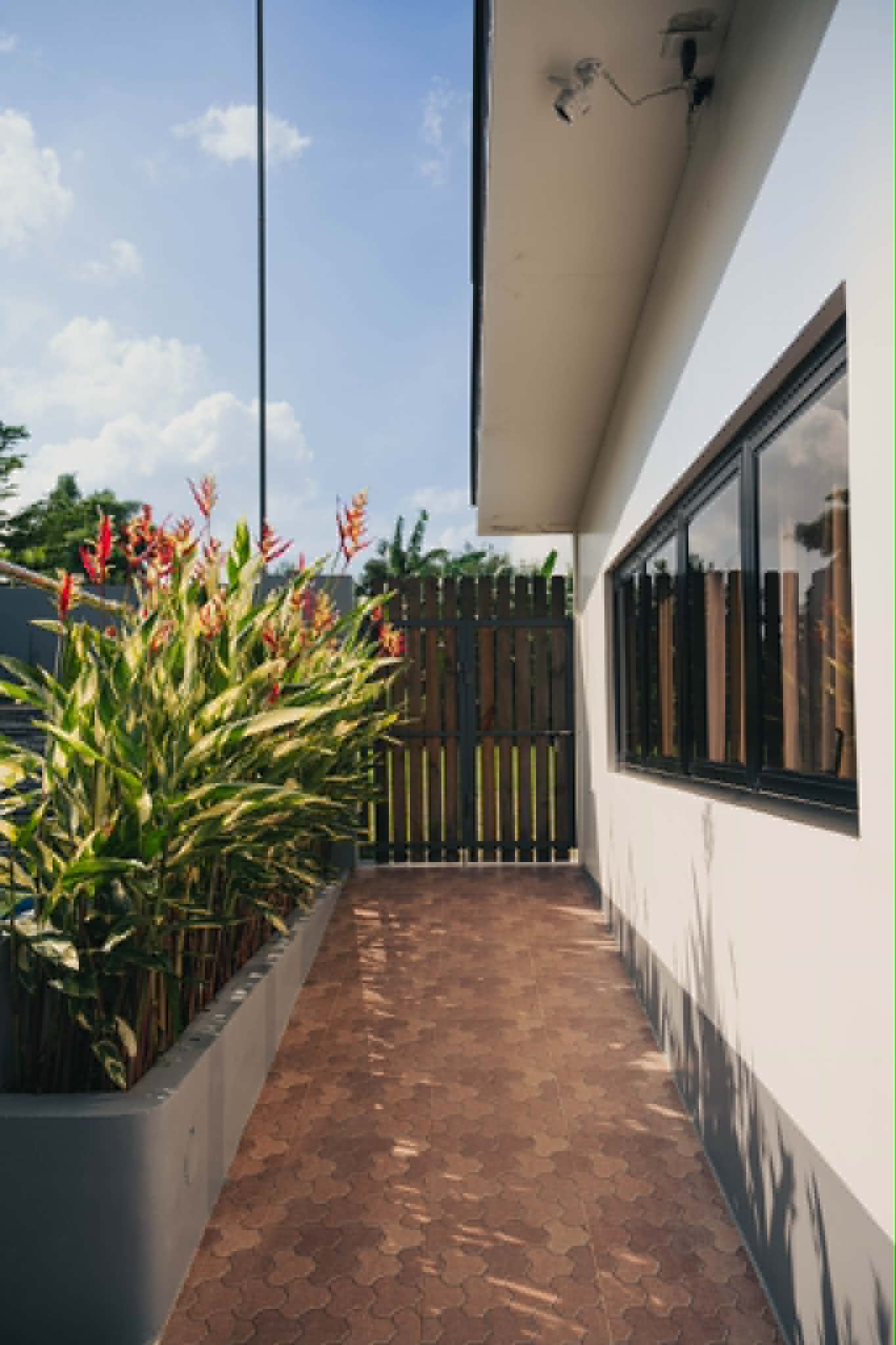 Villa 2 walkway leading to the entertainment room